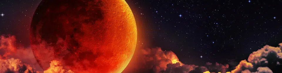 A lua de sangue conhecida como eclipse lunar.